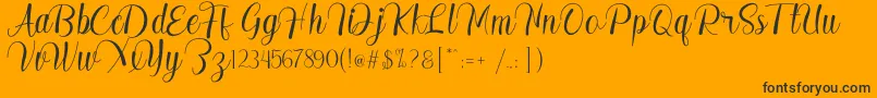 Madelyn Font – Black Fonts on Orange Background