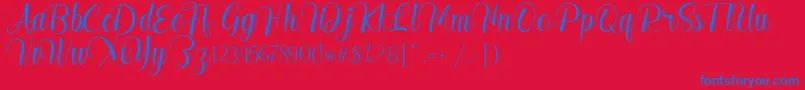 Madelyn-Schriftart – Blaue Schriften auf rotem Hintergrund