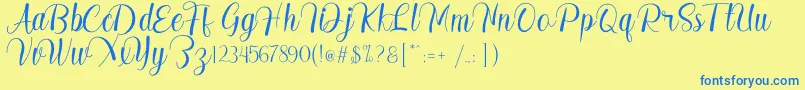 Madelyn Font – Blue Fonts on Yellow Background