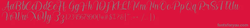 Шрифт Madelyn – серые шрифты на красном фоне
