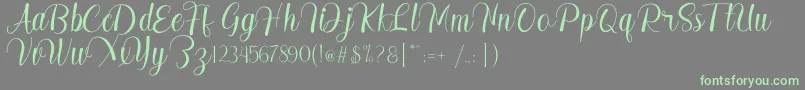 Madelyn Font – Green Fonts on Gray Background