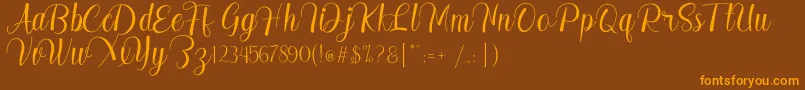Madelyn Font – Orange Fonts on Brown Background