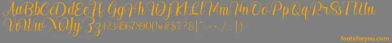 Madelyn Font – Orange Fonts on Gray Background