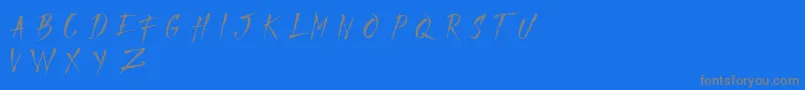 フォントMADFAITH   DEMO – 青い背景に灰色の文字