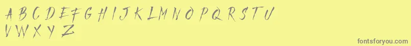 フォントMADFAITH   DEMO – 黄色の背景に灰色の文字