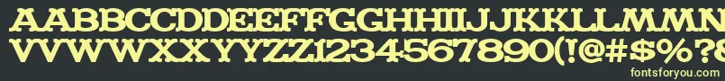 MADFONT Font – Yellow Fonts on Black Background