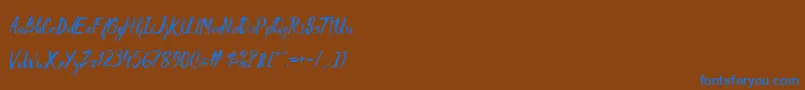 Czcionka Madhouz – niebieskie czcionki na brązowym tle