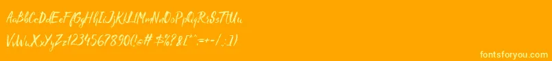 Madhouz Font – Yellow Fonts on Orange Background