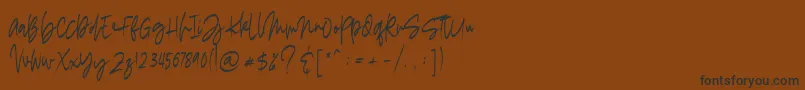 madigel free Font – Black Fonts on Brown Background