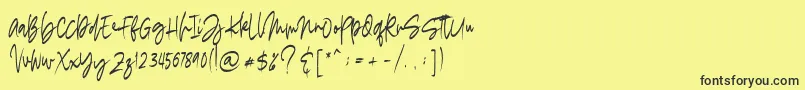madigel free-Schriftart – Schwarze Schriften auf gelbem Hintergrund
