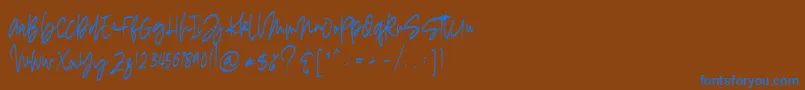 madigel free Font – Blue Fonts on Brown Background
