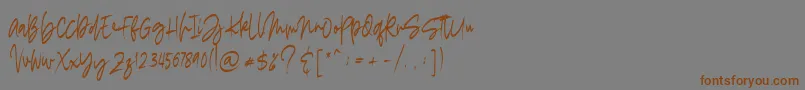 Шрифт madigel free – коричневые шрифты на сером фоне