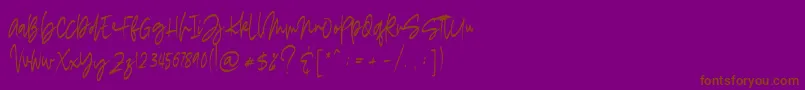 madigel free-Schriftart – Braune Schriften auf violettem Hintergrund
