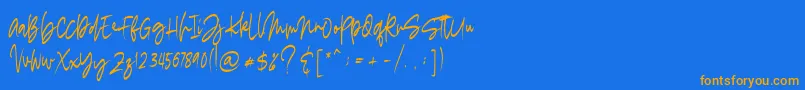 フォントmadigel free – オレンジ色の文字が青い背景にあります。