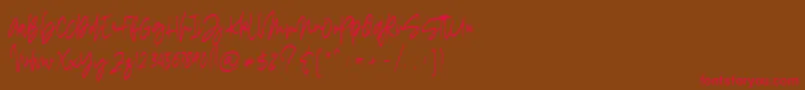 フォントmadigel free – 赤い文字が茶色の背景にあります。