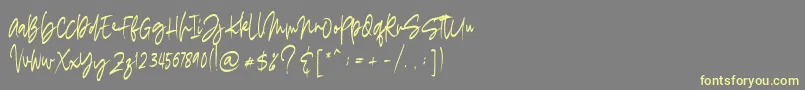 Шрифт madigel free – жёлтые шрифты на сером фоне
