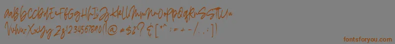 madigel free-Schriftart – Braune Schriften auf grauem Hintergrund