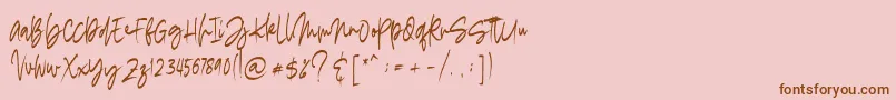 madigel free-Schriftart – Braune Schriften auf rosa Hintergrund
