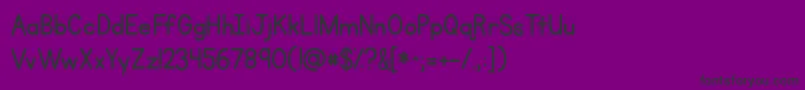Czcionka Kgprimarypenmanship – czarne czcionki na fioletowym tle