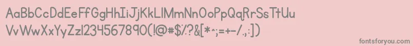 フォントKgprimarypenmanship – ピンクの背景に灰色の文字