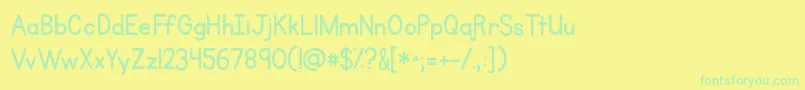 Czcionka Kgprimarypenmanship – zielone czcionki na żółtym tle