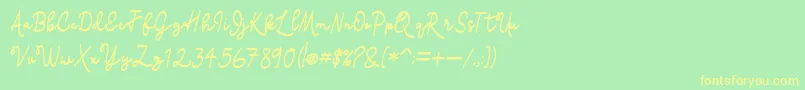 フォントmadison – 黄色の文字が緑の背景にあります