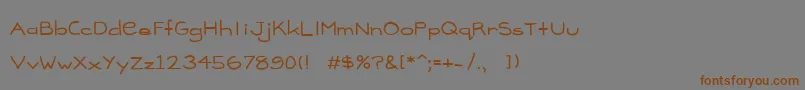 フォントMadison – 茶色の文字が灰色の背景にあります。