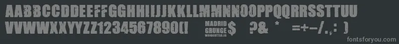 Madrid Grunge-Schriftart – Graue Schriften auf schwarzem Hintergrund