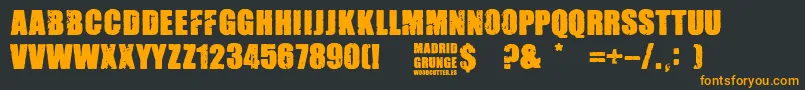 Madrid Grunge Font – Orange Fonts on Black Background