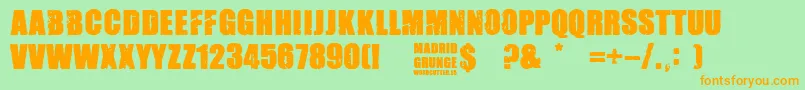 Czcionka Madrid Grunge – pomarańczowe czcionki na zielonym tle