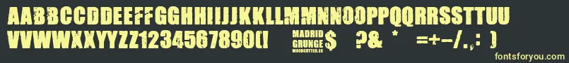 フォントMadrid Grunge – 黒い背景に黄色の文字