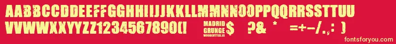 Madrid Grunge-Schriftart – Gelbe Schriften auf rotem Hintergrund