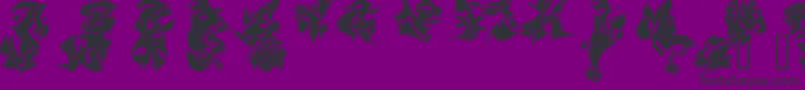 Czcionka MAELS    – czarne czcionki na fioletowym tle