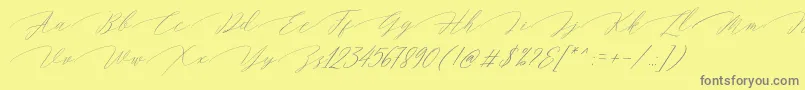 Magarella Script-Schriftart – Graue Schriften auf gelbem Hintergrund