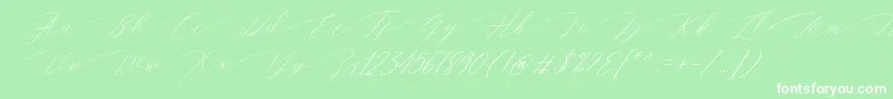 Fonte Magarella Script – fontes brancas em um fundo verde