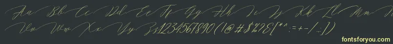 Czcionka Magarella Script – żółte czcionki na czarnym tle