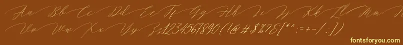 Magarella Script-Schriftart – Gelbe Schriften auf braunem Hintergrund