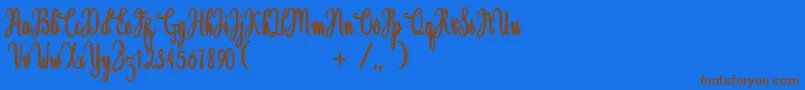 Magdalen Free Font – Brown Fonts on Blue Background