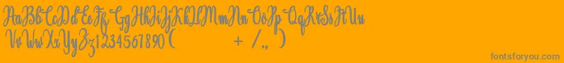 Magdalen Free Font – Gray Fonts on Orange Background