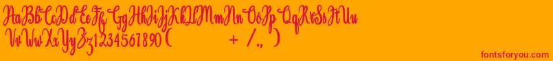 Magdalen Free-Schriftart – Rote Schriften auf orangefarbenem Hintergrund