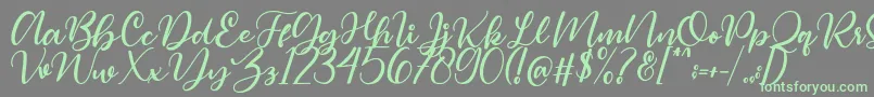 Magelove Font – Green Fonts on Gray Background