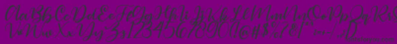 Magelove Font – Black Fonts on Purple Background