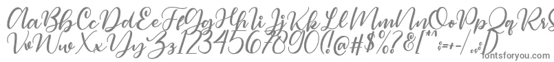 Magelove-fontti – harmaat kirjasimet valkoisella taustalla