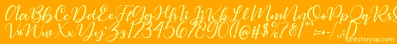 Magelove Font – Yellow Fonts on Orange Background