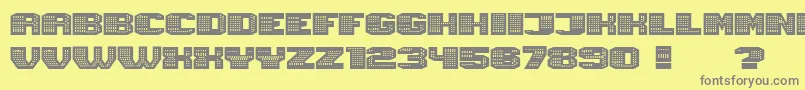 フォントMagia Neon – 黄色の背景に灰色の文字