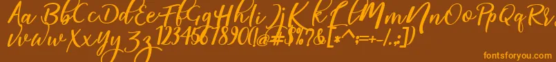 magic dafont Font – Orange Fonts on Brown Background