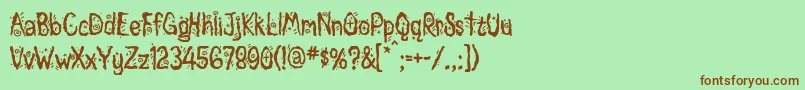 Magician Font – Brown Fonts on Green Background