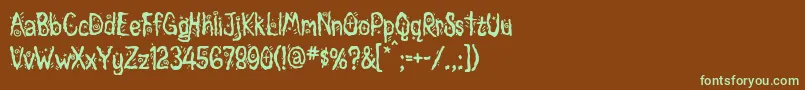 フォントMagician – 緑色の文字が茶色の背景にあります。