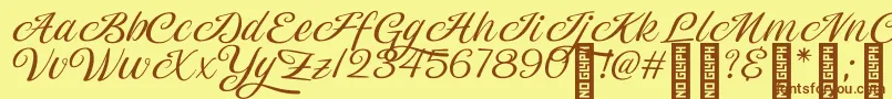 Fonte Magiera Script – fontes marrons em um fundo amarelo