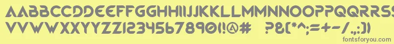 MagmaWave Caps-Schriftart – Graue Schriften auf gelbem Hintergrund